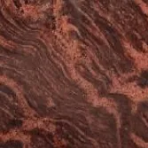 Paradise granite, deep red-brown with pale veining