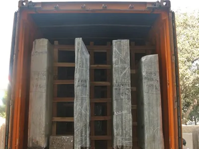 Stone slabs stuffed and secured inside a shipping container